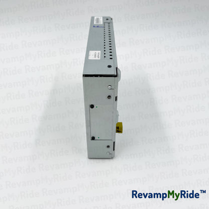 Electrical component on a textured white background with 'RevampMyRide' branding.