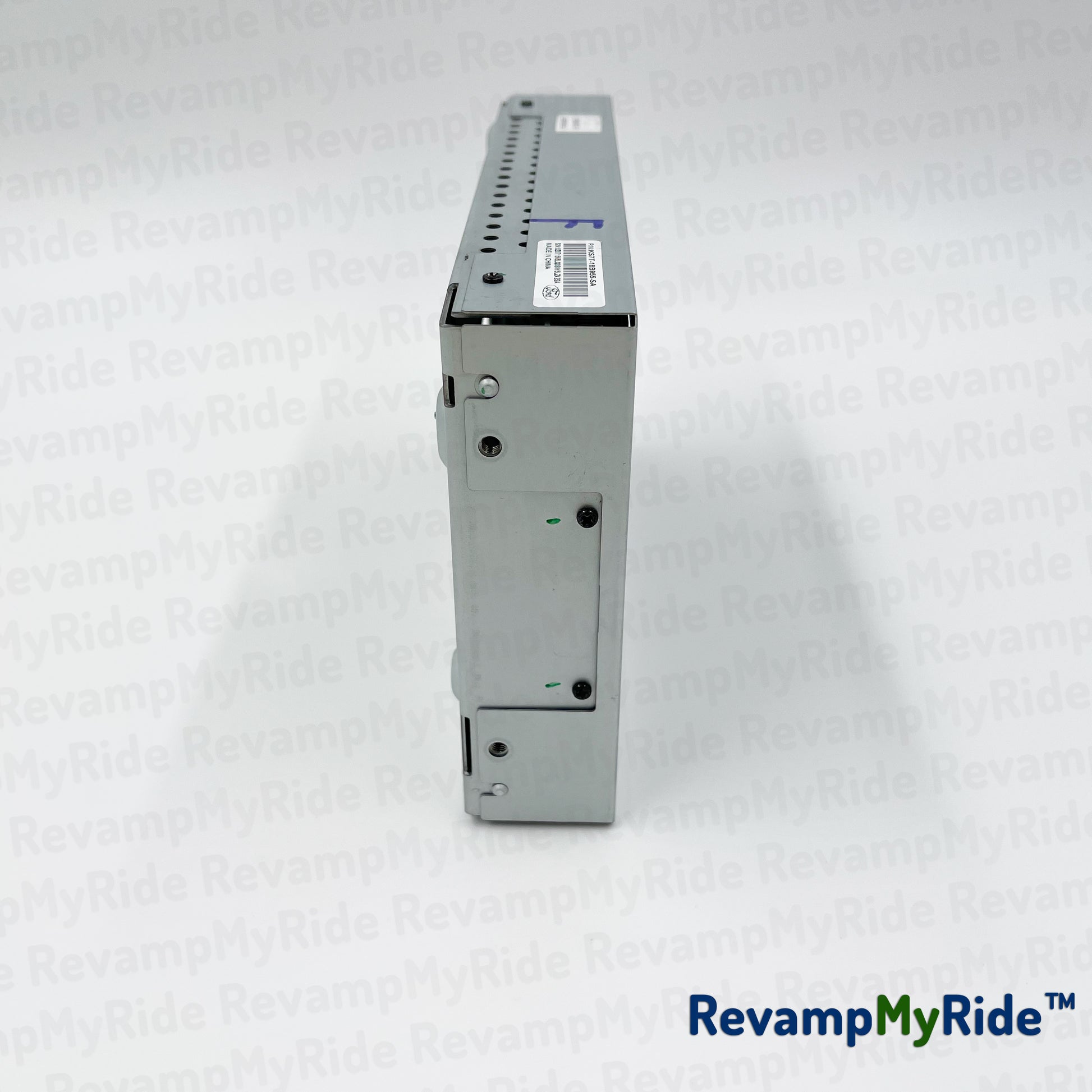 Electrical component on a white textured background with 'RevampMyRide' branding.